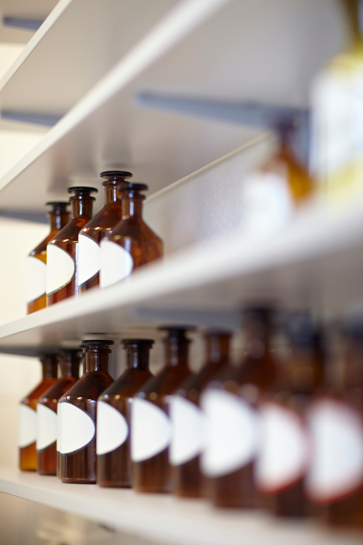 Rows of Bottles in Pharmacy